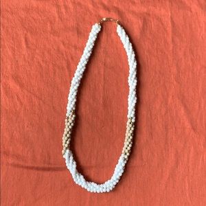 White & tan beaded necklace with gold details 18”